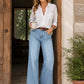 High-Waist Wide-Leg Jeans with Button Detail