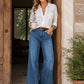 High-Waist Wide-Leg Jeans with Button Detail