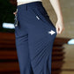 Pantalones casuales de negocios rectos, elásticos y de secado rápido